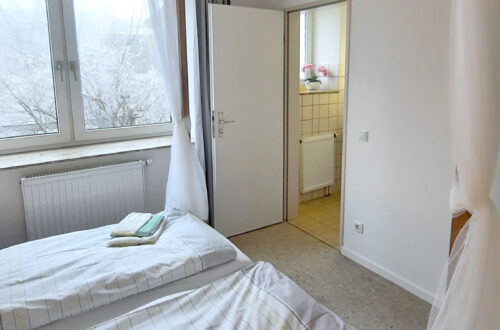 Maison Fasson Ferienwohnung 1 - Schlafzimmer mit Himmelbett