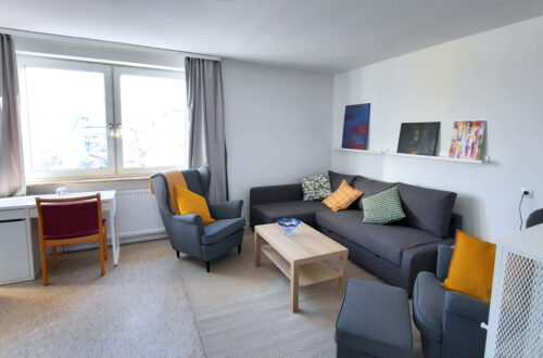 Maison Fasson Ferienwohnung 2 Wohnzimmer Sofa, Sessel, Bilder, Schreibtisch, Sofatisch